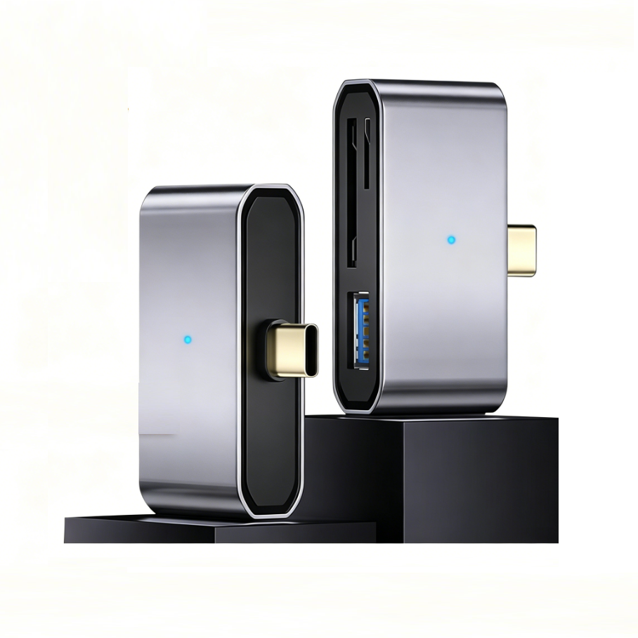 Two slim metallic electronic adapters with gold-toned connector pieces and small blue indicator lights, shown on a clean white background with black display blocks.
