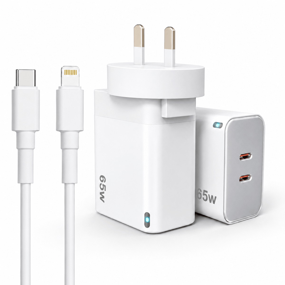 White 65W UK wall charger adapter with two-pin plug, shown with a white USB-C to Lightning cable and a white dual-port USB-C power brick on a clean white background.