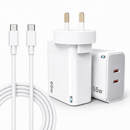 White 65W UK wall charger adapter with two USB-C connectors, shown alongside a matching coiled white cable and a second white charger with two USB-C ports on a clean white background.
