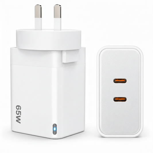 A white 65W UK wall charger adapter shown next to its rectangular USB-C receiver brick on a clean white background.