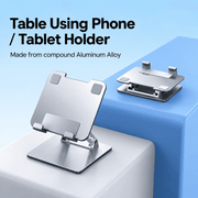 Adjustable height laptop stand for a compatible laptop
