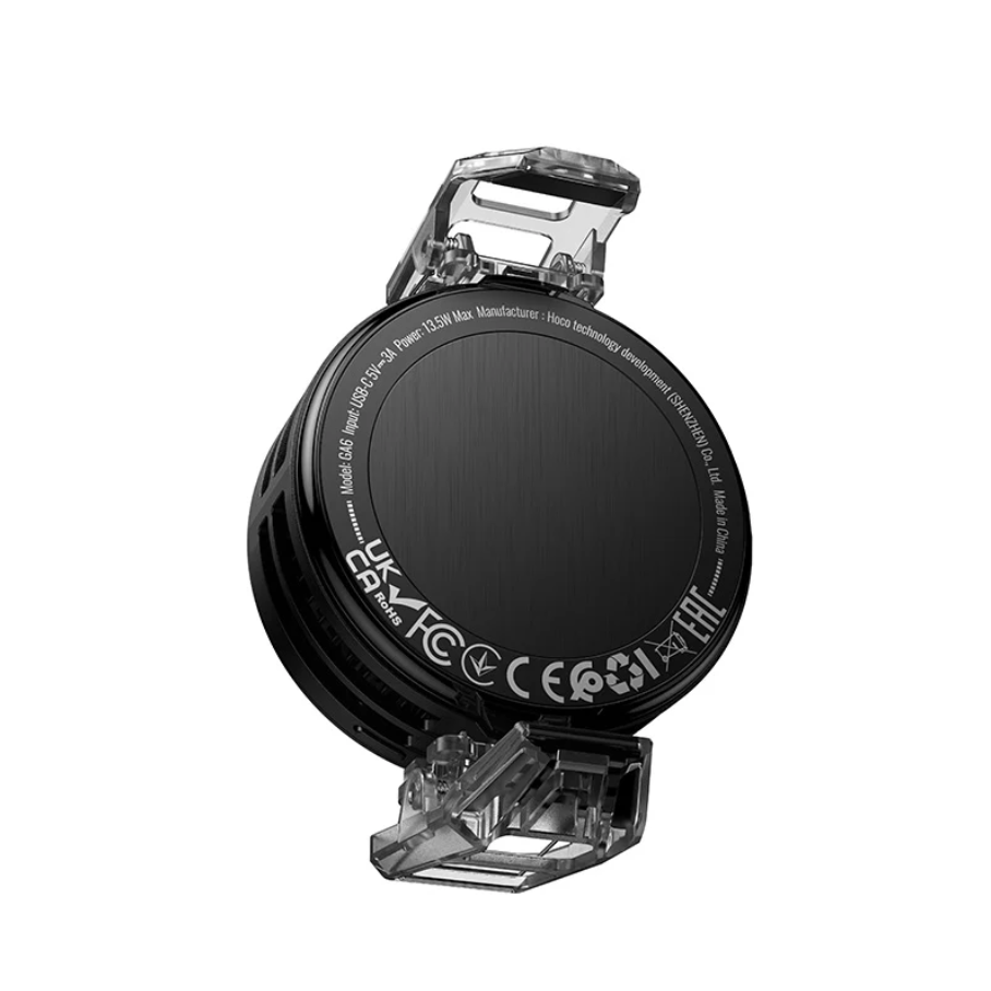 A black circular magnetic power bank with a transparent protective cover and a metal clip, shown on a plain white background.