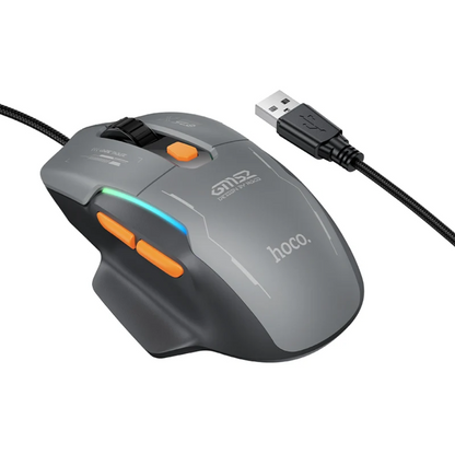 A gray Hoco gaming mouse with orange buttons, a black wired USB cable, and RGB lighting, shown on a white background.