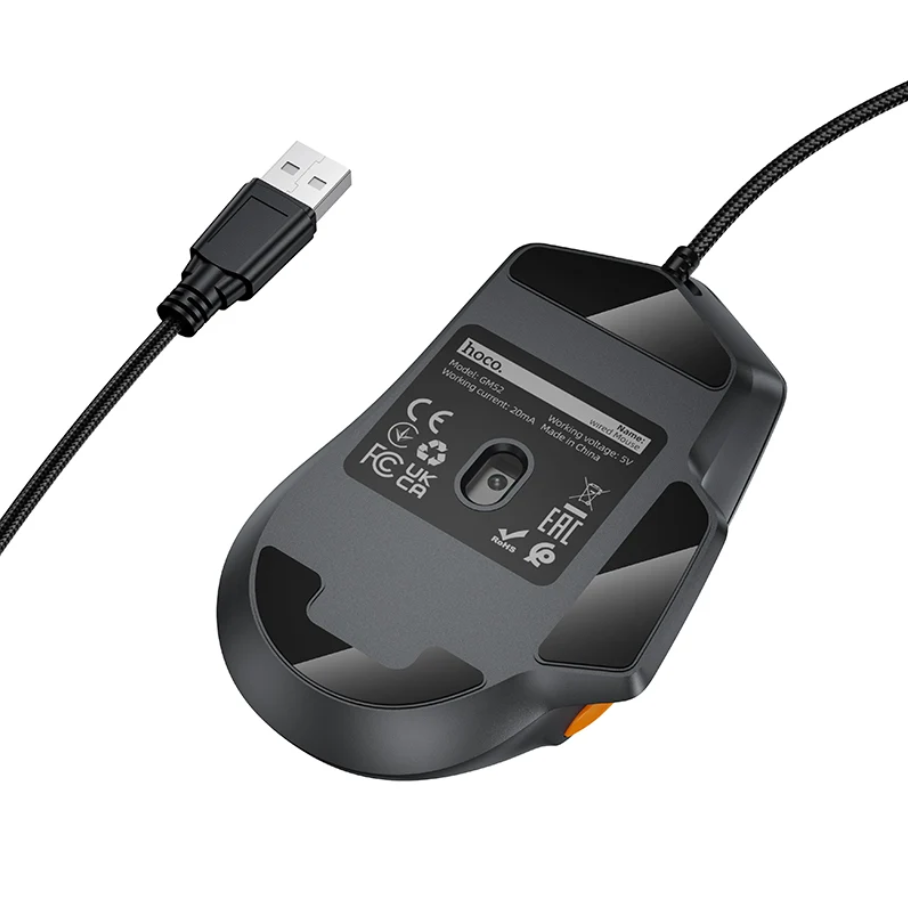 A black wired computer mouse shown from the underside, with a USB connector visible on the left and a small orange accent on the right side. The underside has printed specifications and regulatory symbols on a white background.