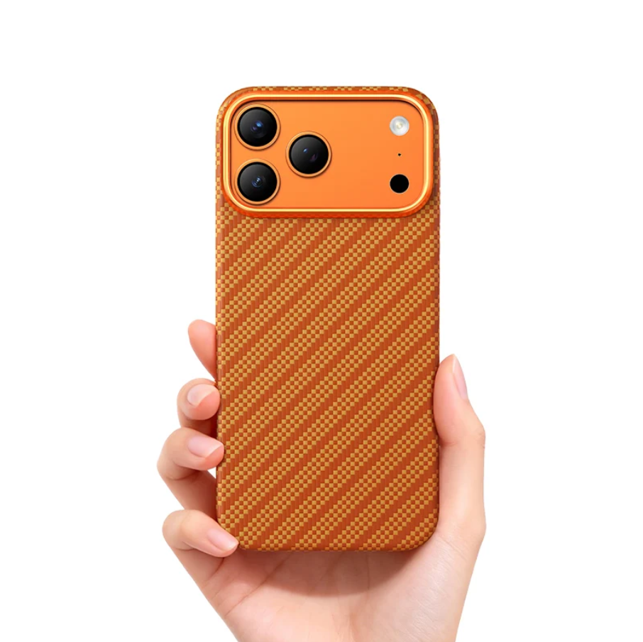 Hand holding a phone with an orange and brown textured case on a white background