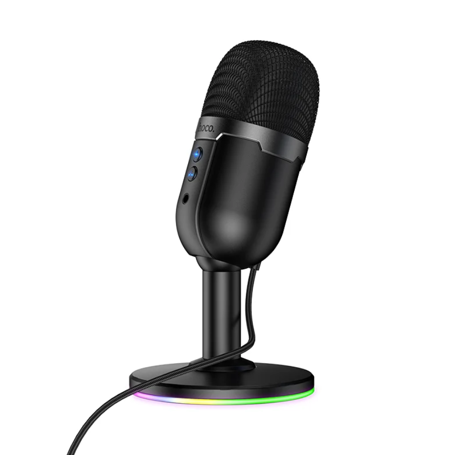 A black USB desktop microphone with a mesh grille, mounted on a stand with a circular base that has a multicolor LED ring, shown on a white background.