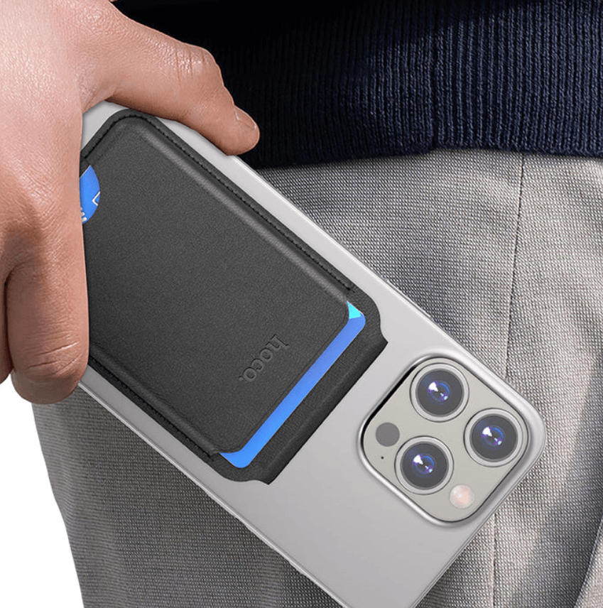 Person holding a phone with a protective case, brand 'Nillkin' visible