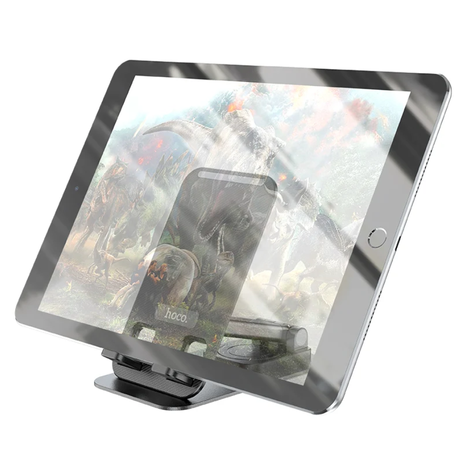 A clear protective screen protector displayed over the screen of a black tablet on a stand, with a phone case mockup shown through the glass. The tablet is photographed on a clean white background.