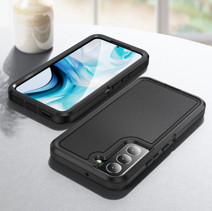 Two black rugged smartphone cases shown on a light tabletop, one upright with a phone inside and one lying flat to display the back and camera cutout.