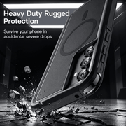 A rugged black phone case shown at an angle with a smartphone inside, set against a dark dramatic background with debris and text reading 'Heavy Duty Rugged Protection' and 'Survive your phone in accidental severe drops.'.