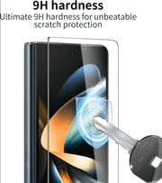 A clear tempered glass screen protector is shown over a smartphone, with a key striking the screen to demonstrate impact resistance. Text at the top reads '9H hardness for unbeatable scratch protection.