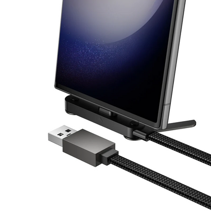 Phone dock with USB cable attached to a smartphone on a white background