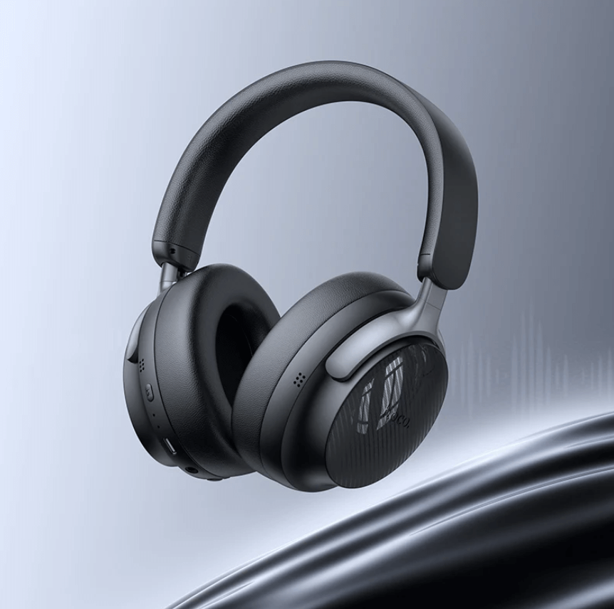 Black over-ear headphones on a gradient blue and gray background