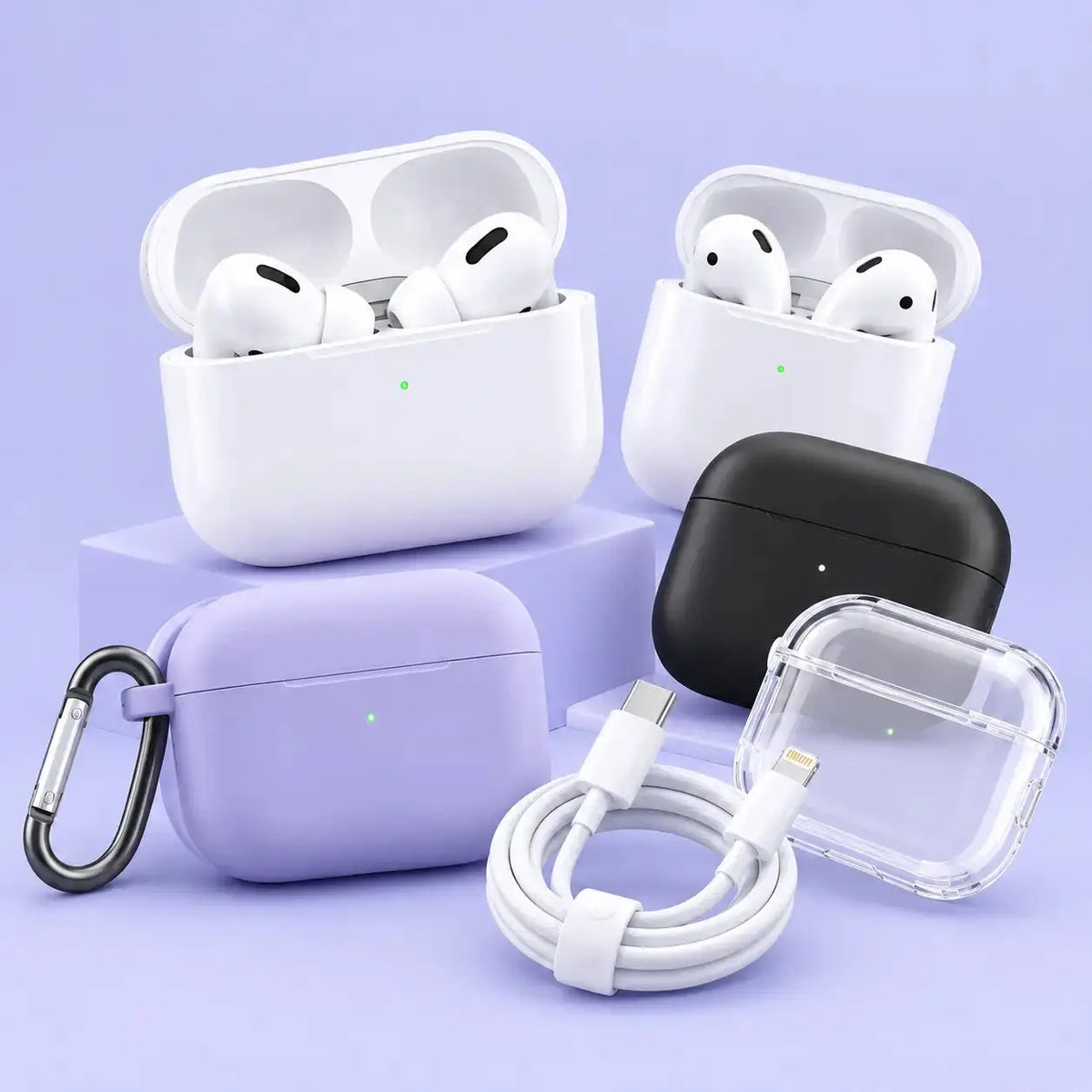 A set of wireless earbuds and multiple charging cases arranged on a light lavender background. The set includes two white AirPods in open white cases, a lavender AirPods case with a black carabiner clip, a black AirPods case, a clear transparent case, and a white charging cable.